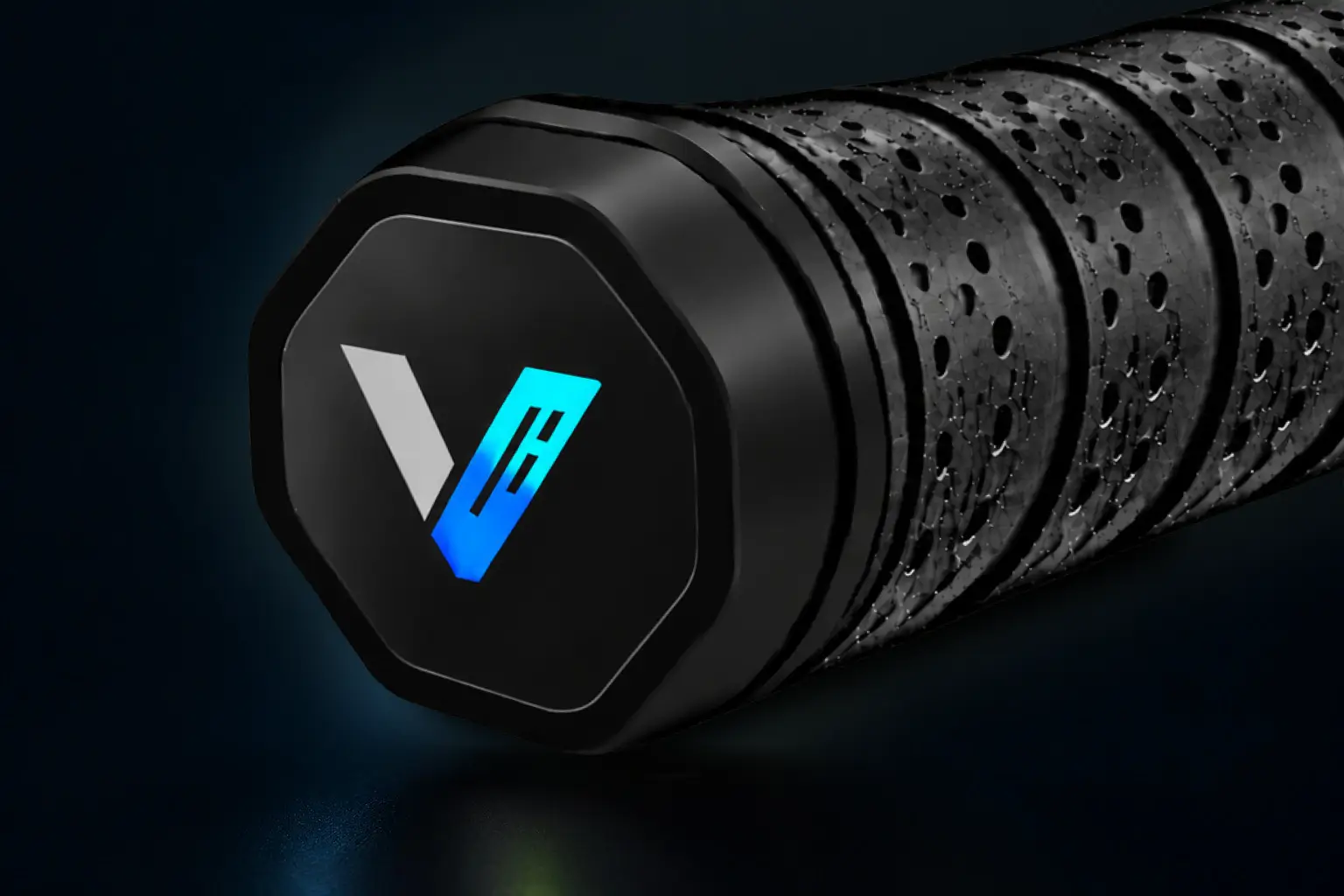 Enhanced close-up of the black VyroIQ circular sensor fitted to a paddle handle, with its white brand mark and green accent clearly visible